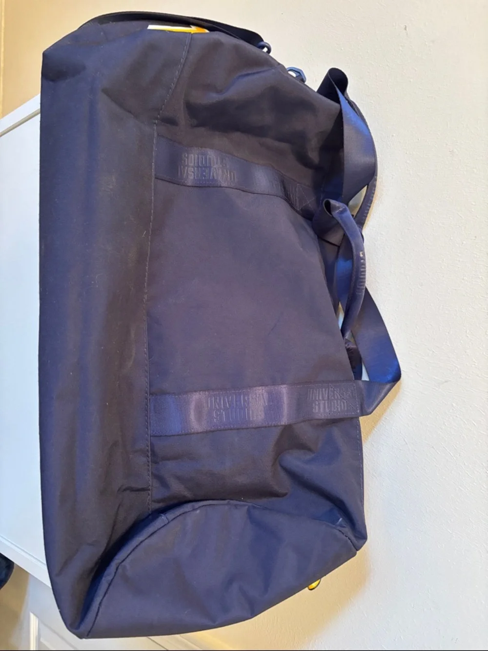Limited 1912 Universal Studios Navy Duffel Bag with Yellow Logo Accent